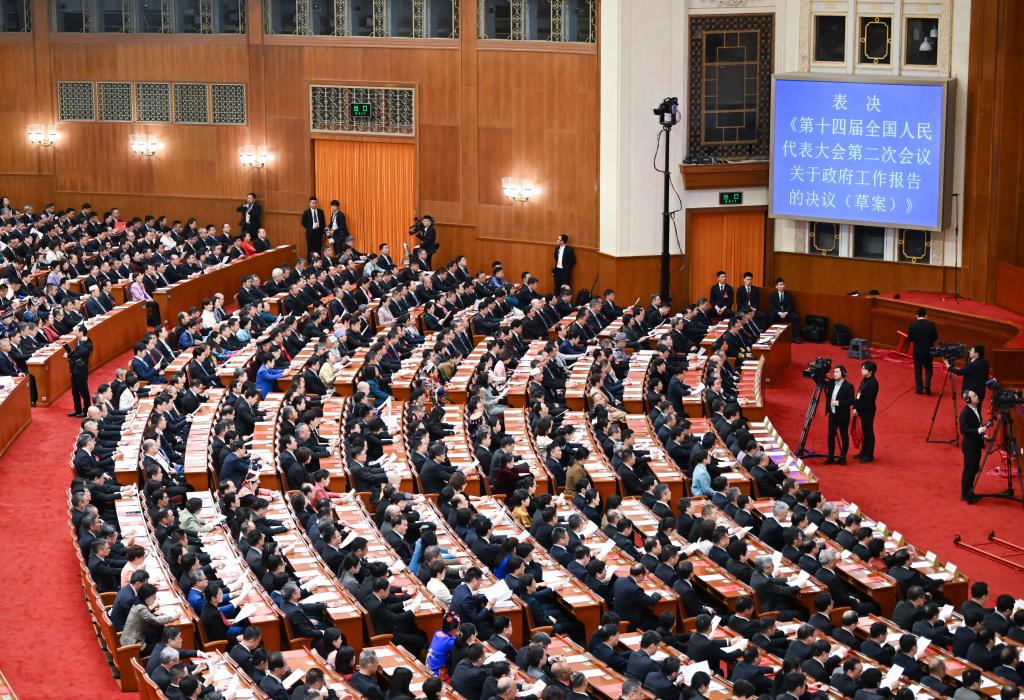 3月11日，第十四屆全國人民代表大會第二次會議在北京人民大會堂舉行閉幕會。新華社記者 牟宇 攝