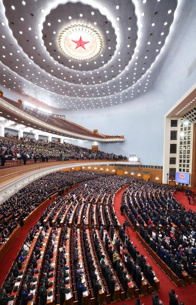 3月11日，第十四屆全國人民代表大會第二次會議在北京人民大會堂舉行閉幕會。新華社記者 丁林 攝